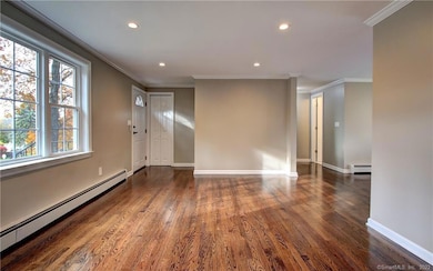 VIEW FROM THE FIREPLACE ANGLE. LARGE LIVING/ENTERTAINMENT ROOM