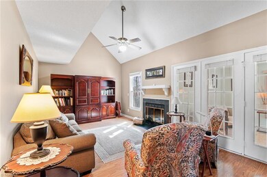 Great Room; vaulted ceiling; easy access to the kitchen for snacks & the sun-filled sunroom