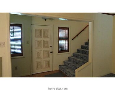 Interior Space/Layout. Foyer and stairway at the f