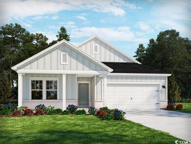 View of front of home featuring a garage and a fro