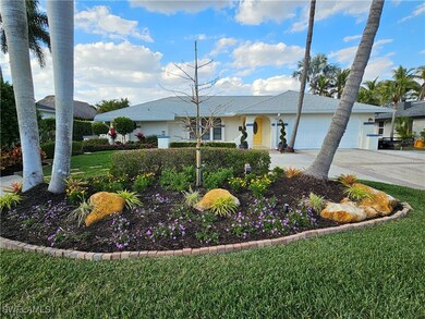 Single story home featuring an attached garage, co