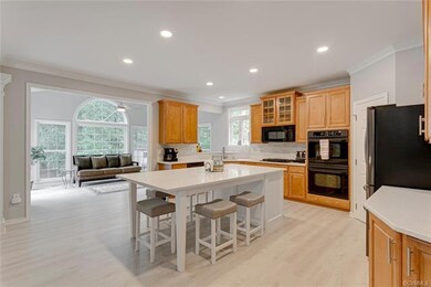 Renovated kitchen with new flooring, gas cooktop, 