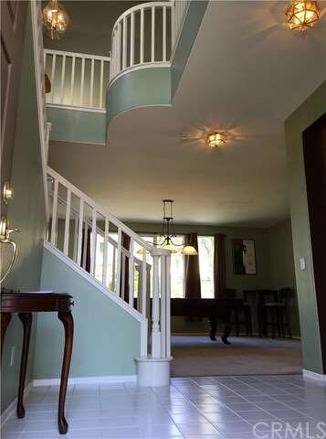 Upon Entrance you see the Beautiful Staircase and 