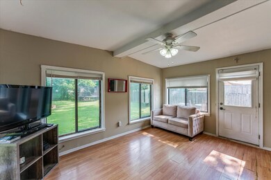 4 season room with door to backyard