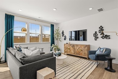 Living room with recessed lighting, wood finished 