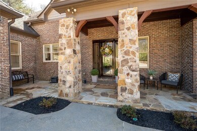Custom stack stone columns and craftsman front door