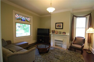 Spacious living room with new flooring and beautif