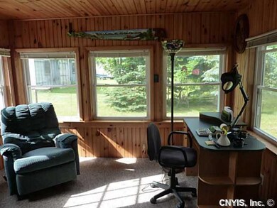 Porch - Enclosed. 3 season room. Is insulated and 