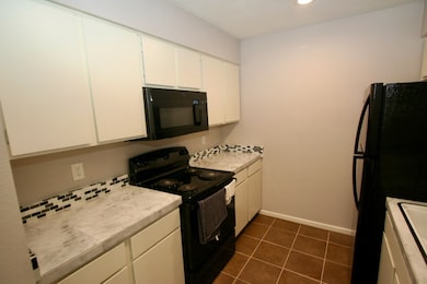 Microwave and electric oven. Refrigerator included