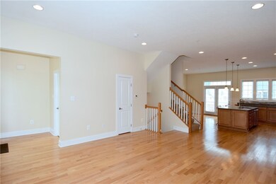 View from the family room back to the kitchen and