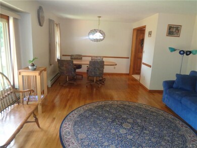OPEN TO DINING AREA, KITCHEN TO RIGHT