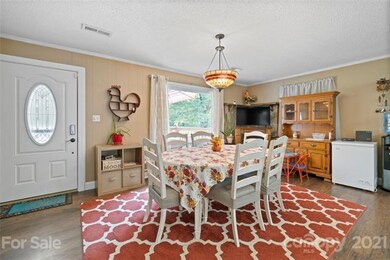 Enter Accented  Beveled Front Door to  Fun Dining Area &  Kitchen
