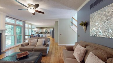 Gorgeous open and bright floor plan with hardwoods