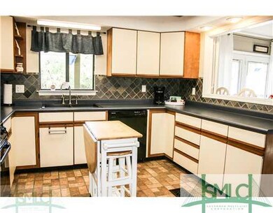 Kitchen. Kitchen has breakfast bar and is open to 