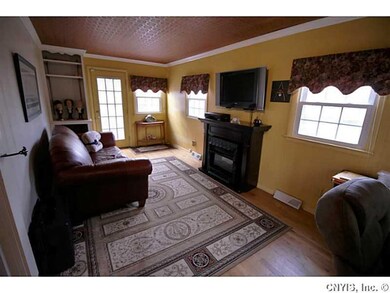 Other. enclosed porch serves as a great spot for a
