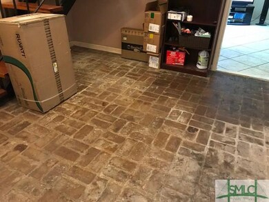 Brick floored foyer