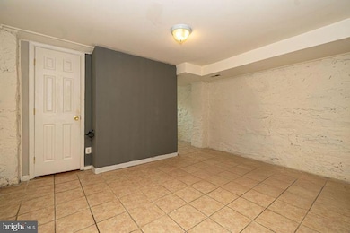 307 E 25th St unit BASEMENT APARTMENT, Baltimore, MD 21218 - photo 4