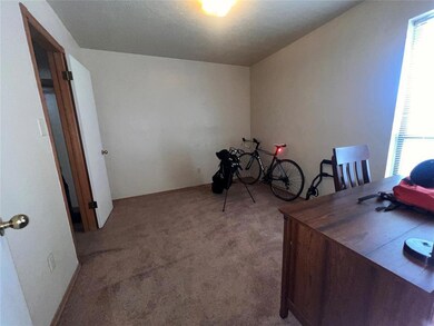 Office featuring light carpet