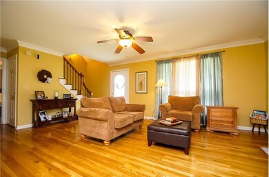 Formal Living room, with hardwood floors & fireplace