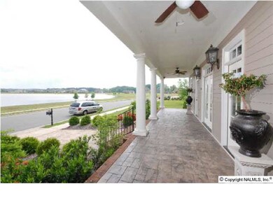. YOUR BEAUTIFUL NEW HOME HAS A COVERED FRONT PORCH WITH LARGE COLUMNS, PROFESSIONALLY LANDSCAPED YARD AND TONS OF CURB APPEAL.