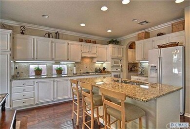 Light and bright kitchen with beautiful granite co
