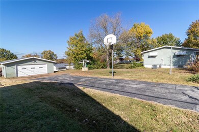 Detached garage has it's own separate driveway