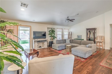Living area with visible vents, plenty of natural