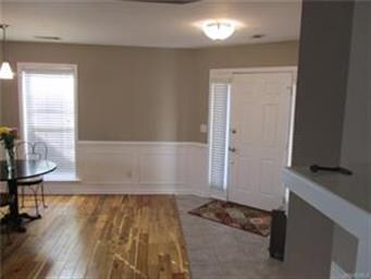 Another view of foyer and dining room