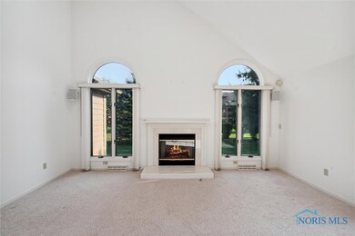 SPACIOUS LIVING ROOM WITH GAS FIREPLACE, TWO SKYLI