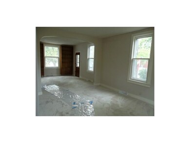 Second living room with a formal dining room