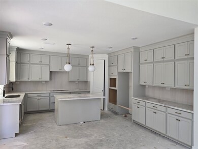 Large Kitchen with extra cabinets in breakfast are