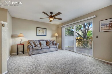 Family room with cozy gas fireplace and large slid