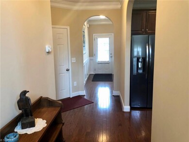 Entryway and main hallway opens to all areas of main level living.