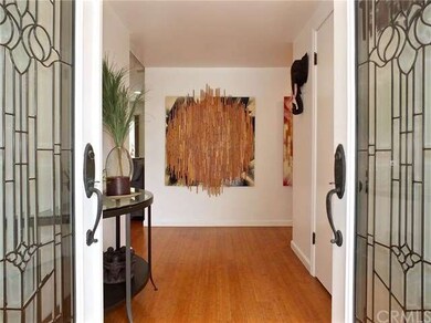 Double glass front door creates a very inviting en