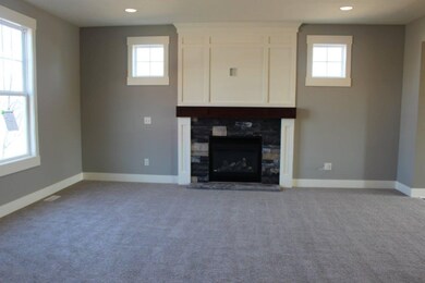Great room with stone gas fireplace