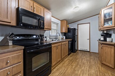 .  You will love the big kitchen with lots of counter space and built in glass cabinets off the dining room.