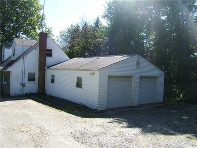 Other. THE LARGE GARAGE CAN EASILY HOLD THREE CARS