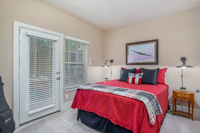 This downstairs secondary bedroom is generously si