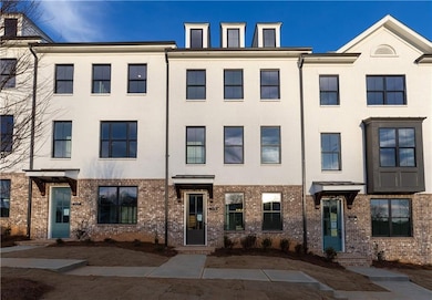 End unit home, Glendale floor plan, three story home with 3 bdrm 3.5 bath, previous model home, furniture not included, built by The Providence Group