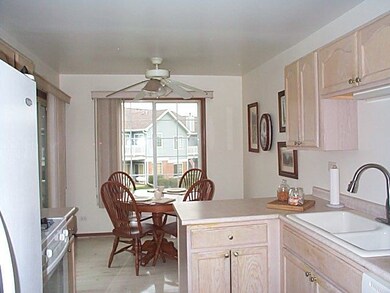 Sliders to balcony & great views from kitchen wind