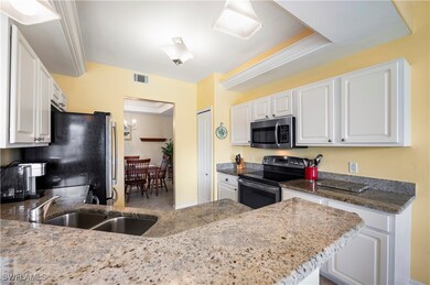 Stainless Steel appliance, granite countertops.