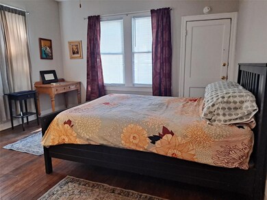 Bedroom featuring wood finished floors