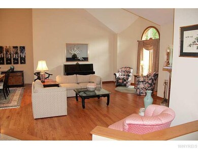 Living Room. Soaring ceilings surround this lovely