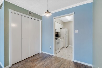 The laundry area is hidden behind those doors.