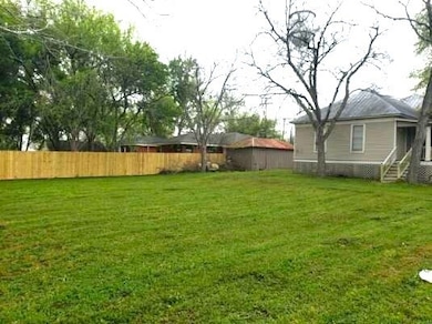 Back yard and extra lot
