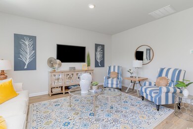 Living area featuring wood finished floors