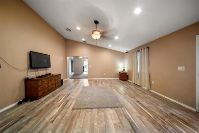 Unfurnished living room featuring light wood-type 