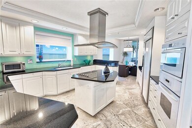 Kitchen with crown molding, island exhaust hood, w