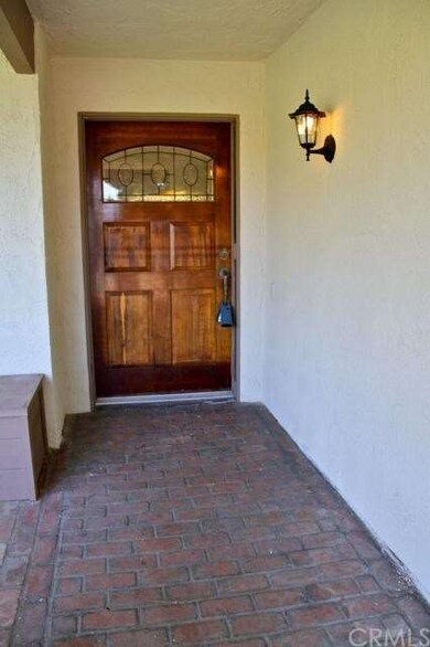 Beautiful front door with leaded window.