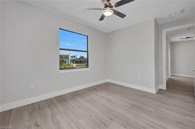 Unfurnished room with visible vents, ceiling fan, 